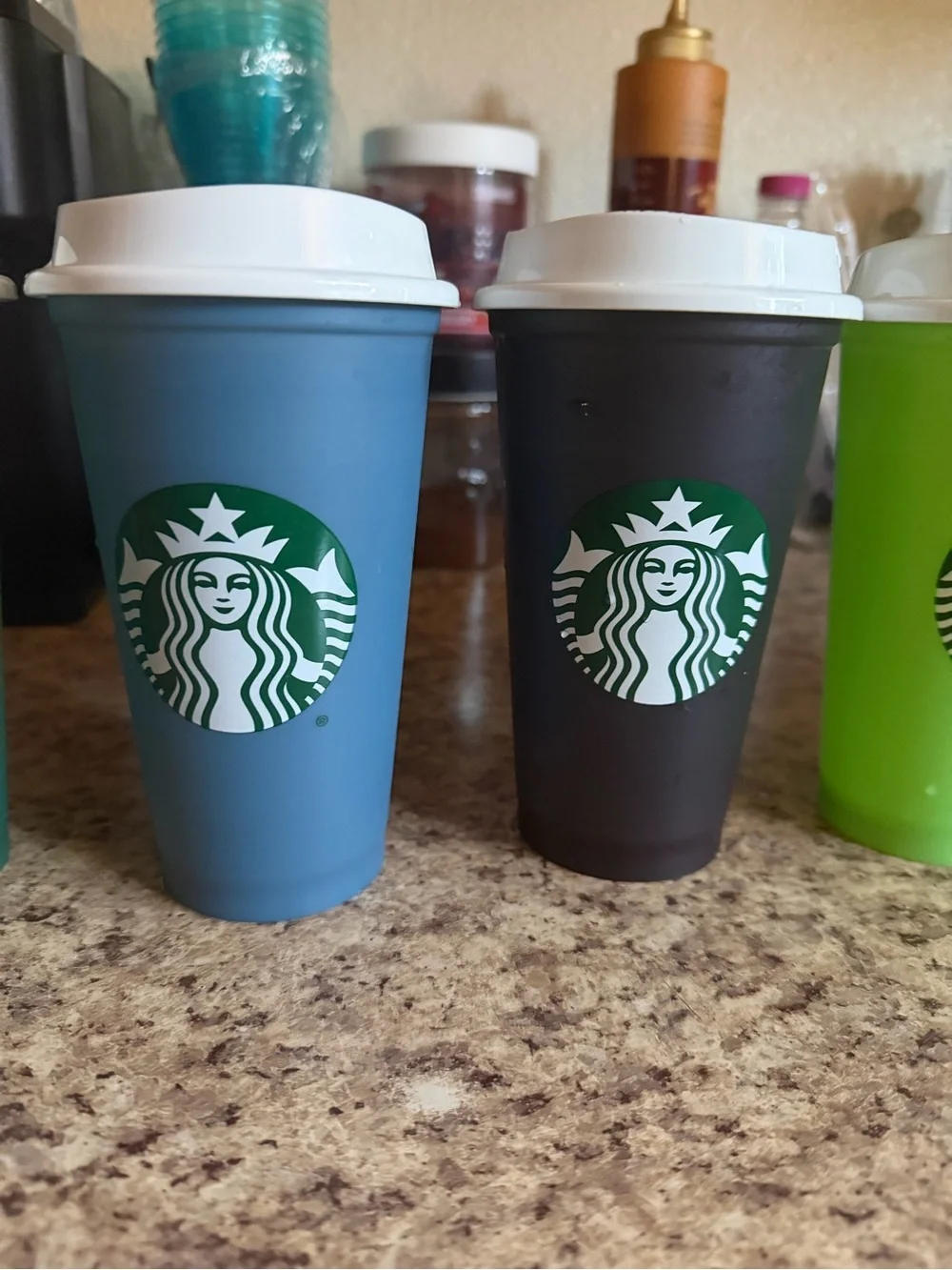 Starbucks Red and Gray Reusable Cups with White Lids